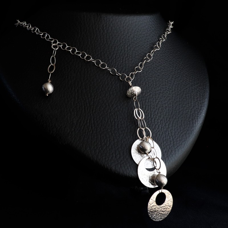 silver necklace with hanging rings