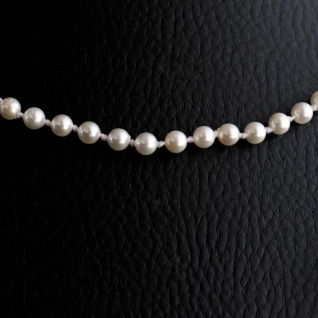 necklace with white shiny pearls