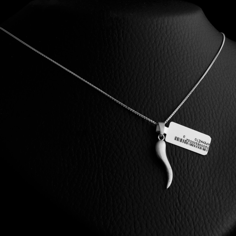 silver necklace in the shape of a tear